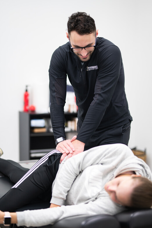 Runner undergoing a functional movement assessment at a sports rehabilitation clinic in Springfield, MO
